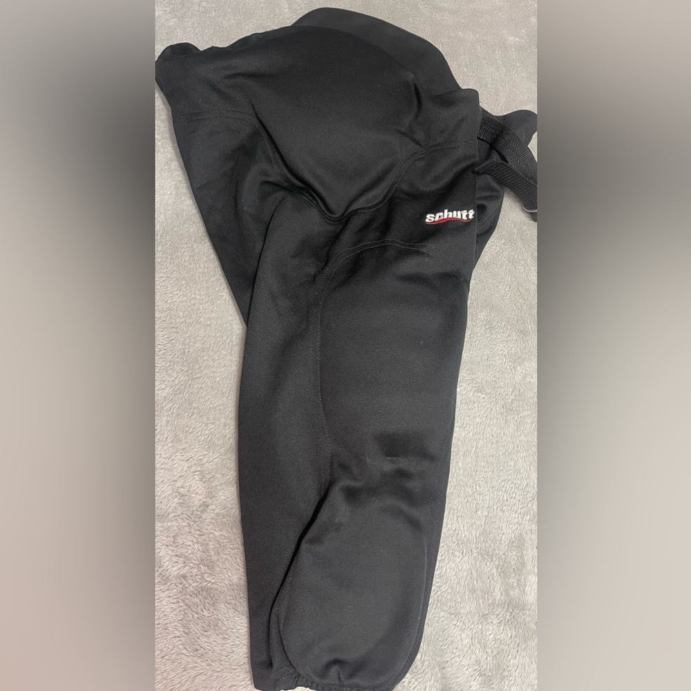 Men’s Schutt football pants size XL